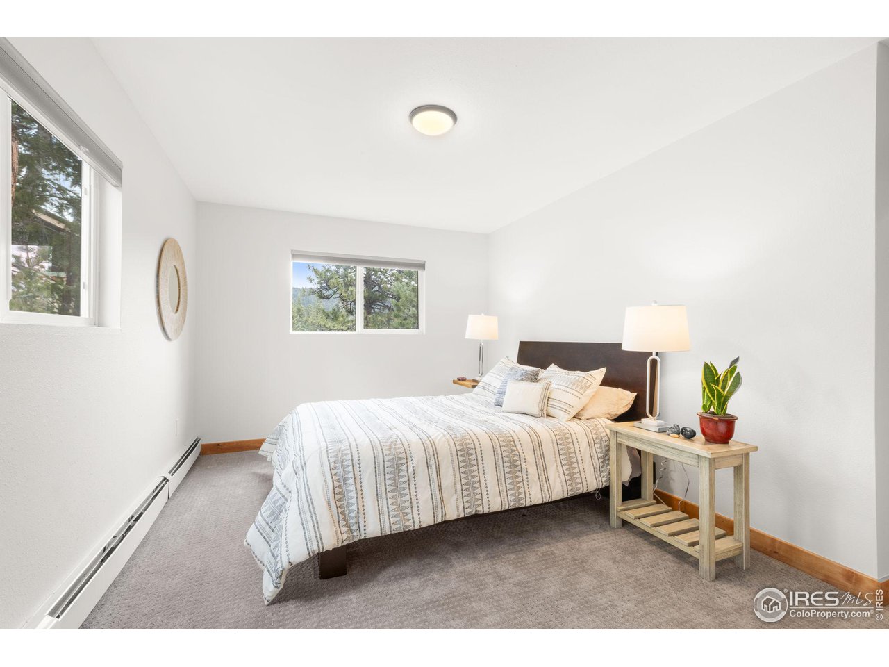 801 Kelly Road West Boulder, CO 80302 - Photo 24 of 33 a bedroom with a bed and a window