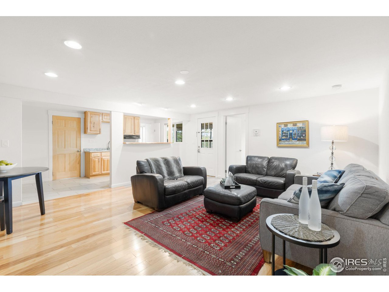 801 Kelly Road West Boulder, CO 80302 - Photo 28 of 33 a living room with furniture and a wooden floor
