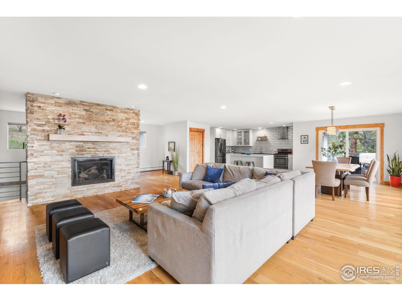 801 Kelly Road West Boulder, CO 80302 - Photo 5 of 33 a living room with furniture and a fireplace