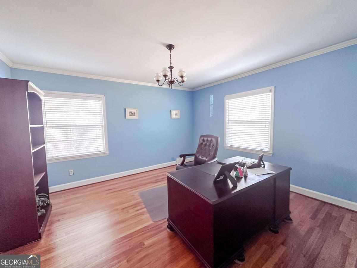 1106 Mt Vernon Road Vidalia, GA 30474 - Photo 6 of 24 a room with furniture and window