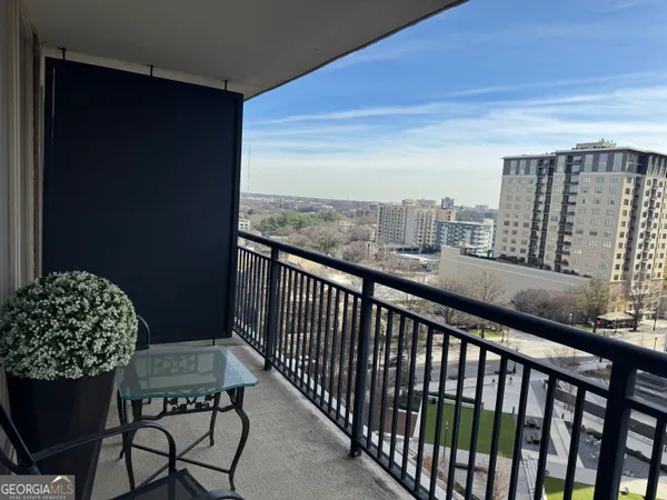 a balcony with a water view