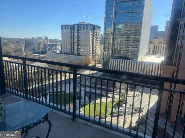 a view of balcony with a roof deck