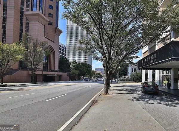 a building exterior with stairs and windows