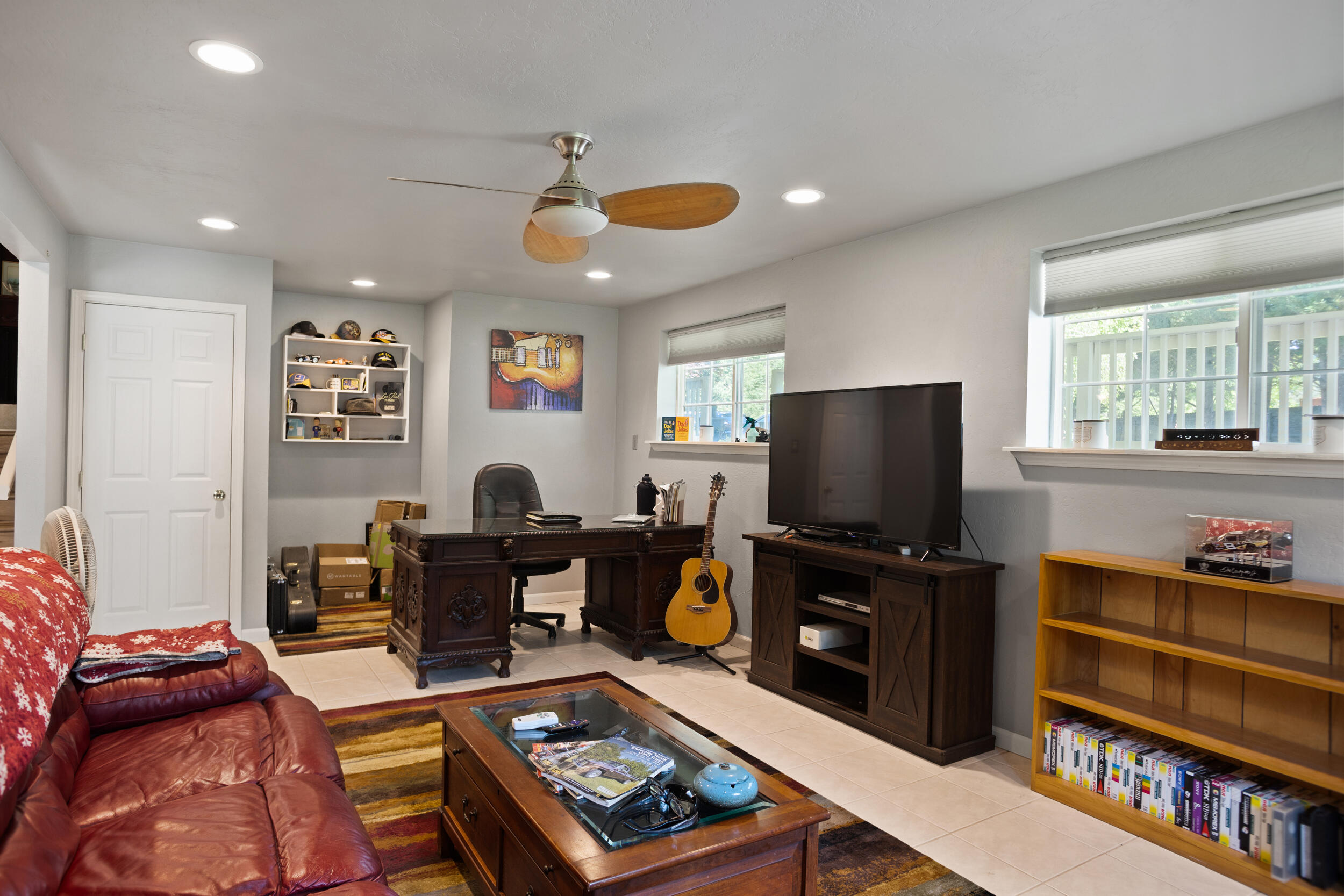 255 Queens Branch Road Rogue River, OR 97537 - Photo 28 of 60 a living room with furniture and a flat screen tv