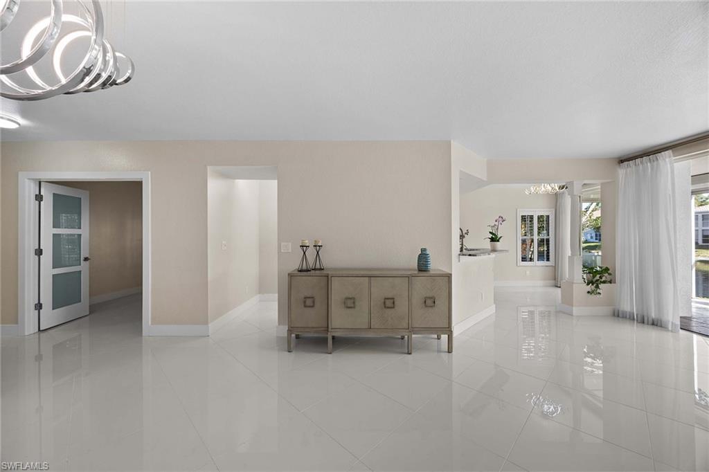 6834 Lantana Bridge Road, Unit 101 Naples, FL 34109 - Photo 37 of 50 a view of a livingroom with furniture