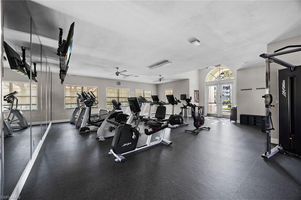 6834 Lantana Bridge Road, Unit 101 Naples, FL 34109 - Photo 42 of 50 a view of a room with gym equipment
