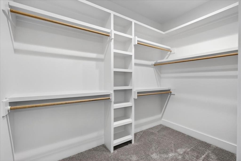 114 Castlewood Road Enchanted Oaks, TX 75156 - Photo 22 of 33 a view of an empty walk in closet