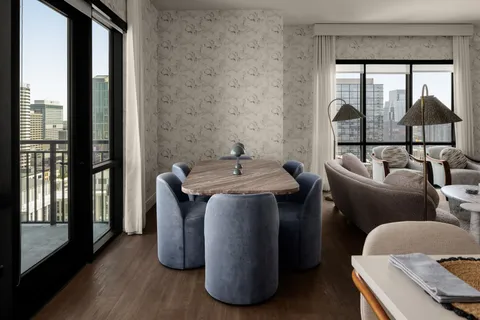 a living room with furniture and a window