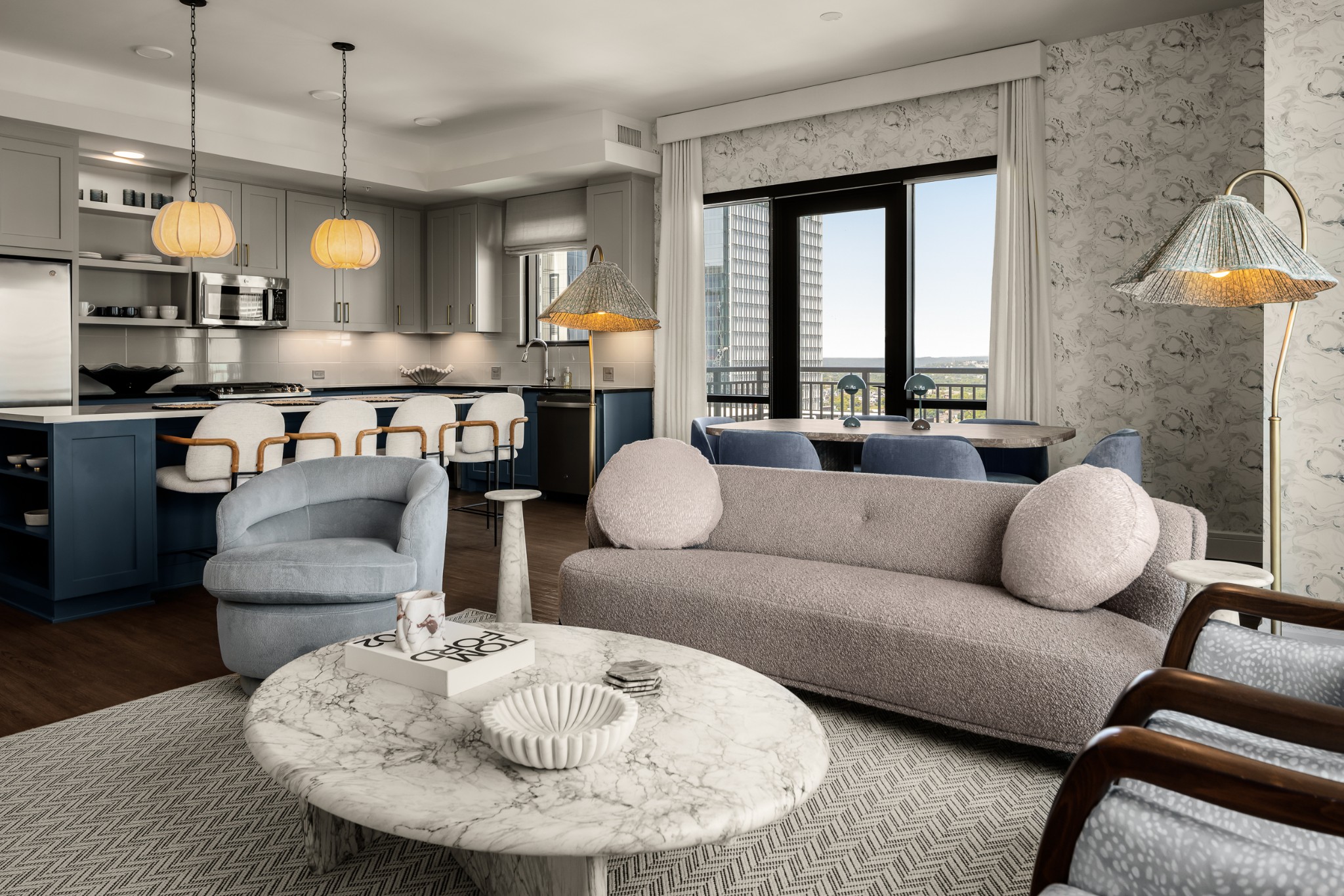 930 Commerce Street, Unit 2 Nashville, TN 37203 - Photo 15 of 57 a living room with furniture a chandelier and a large window