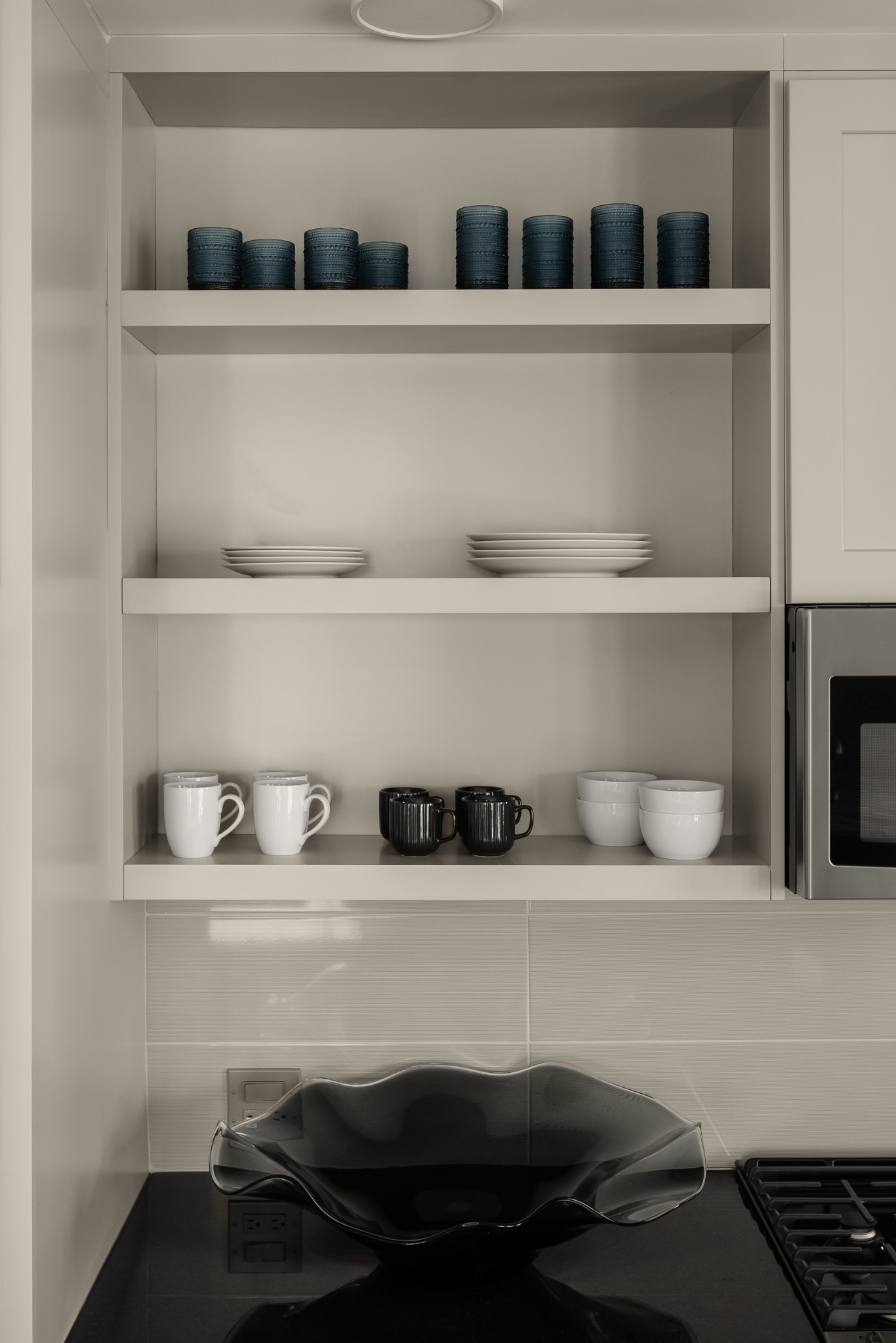 930 Commerce Street, Unit 2 Nashville, TN 37203 - Photo 19 of 57 a shelf with a potted plant on it