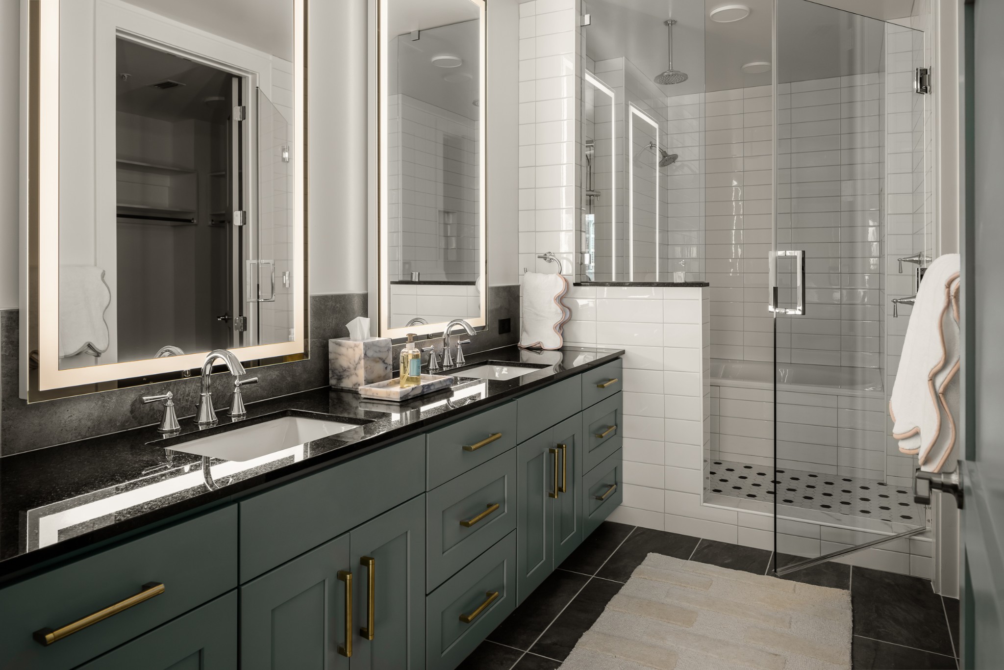 930 Commerce Street, Unit 2 Nashville, TN 37203 - Photo 23 of 57 a bathroom with double vanity and a mirror