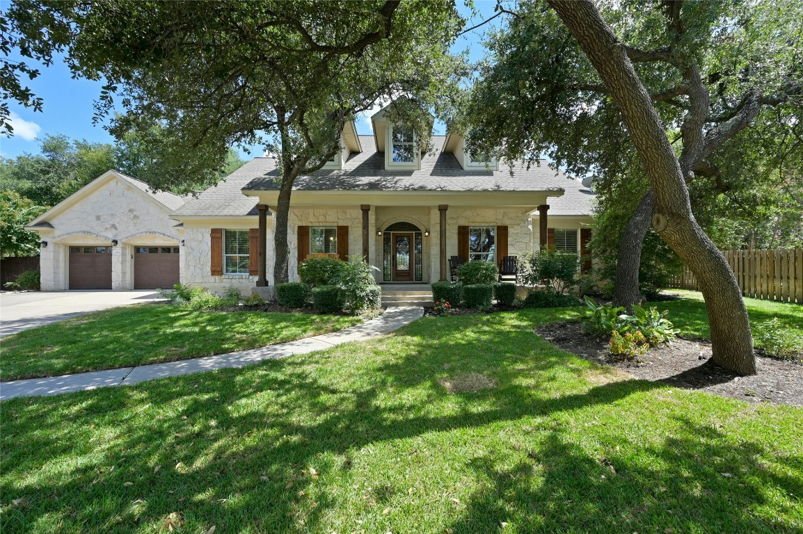 2906 Cedar Crest Circle Round Rock, TX 78665 - Photo 1 of 1 a front view of a house with a garden