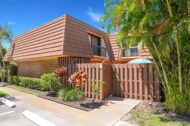 a front view of a house with a garage