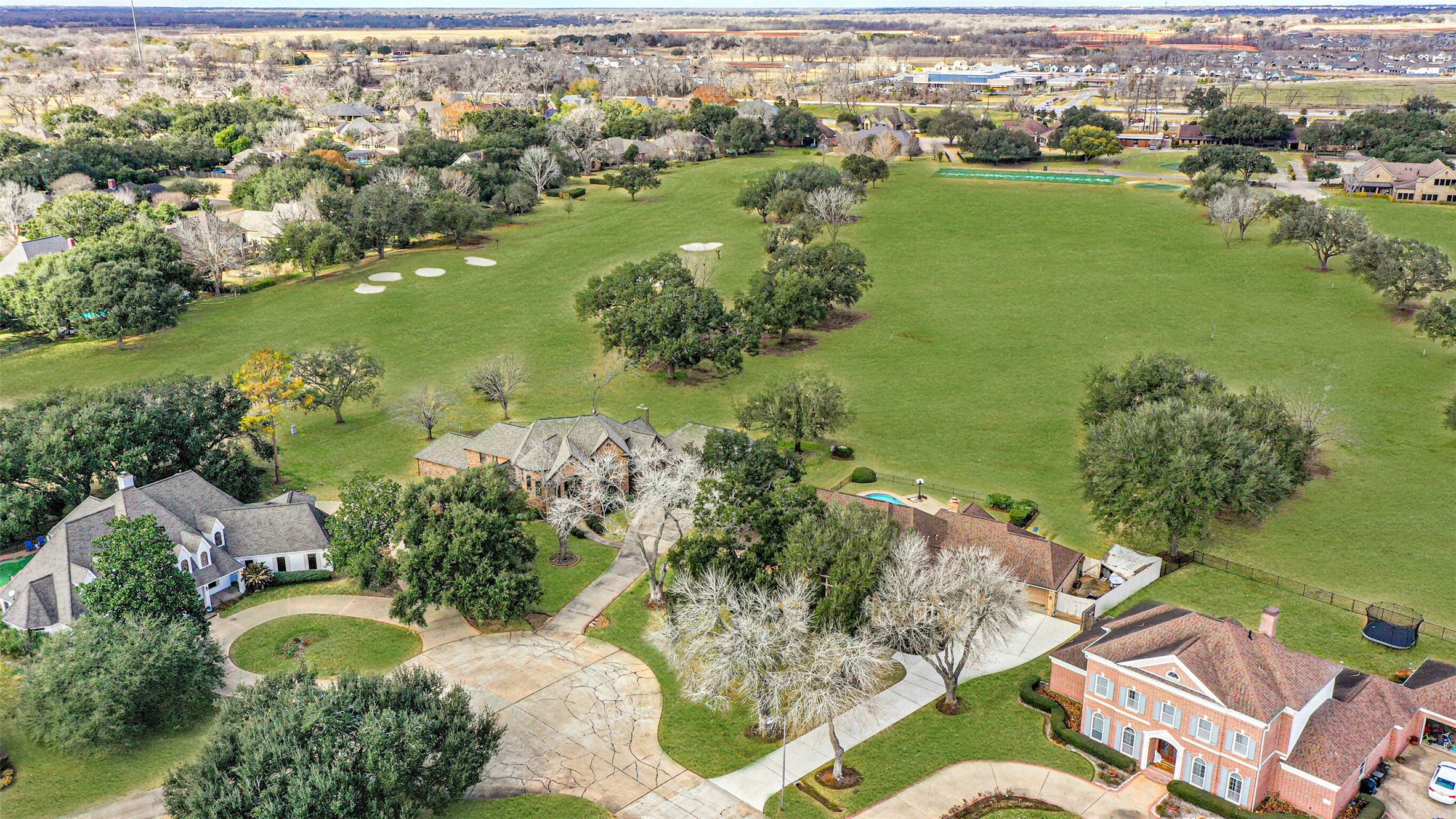 32726 Weybridge Street Fulshear, TX 77441 - Photo 49 of 50 an aerial view of residential houses with outdoor space