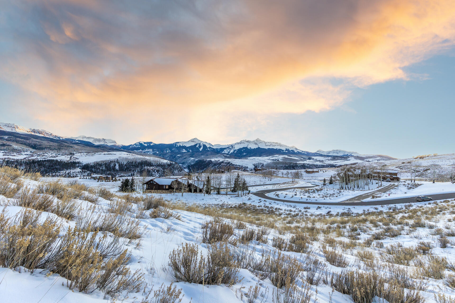 a view of a lake with mountains in the background