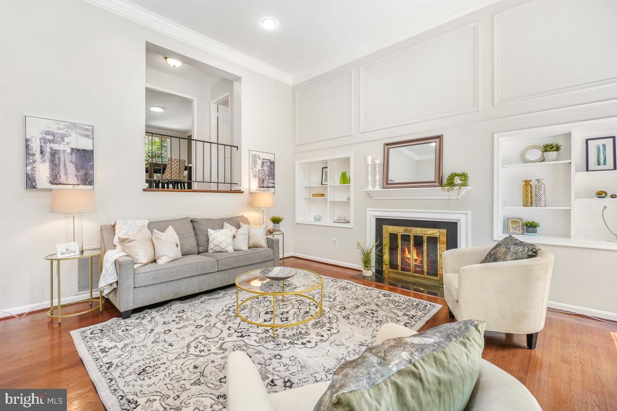 2757 Unicorn Lane Northwest Washington, DC 20015 - Photo 13 of 43 a living room with furniture and a fireplace