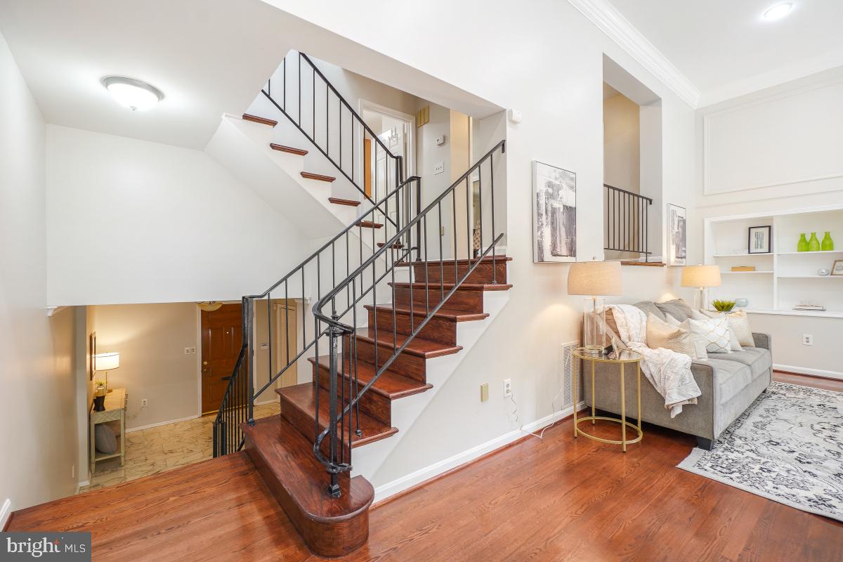 2757 Unicorn Lane Northwest Washington, DC 20015 - Photo 14 of 43 a view of entryway bedroom and hall with wooden floor