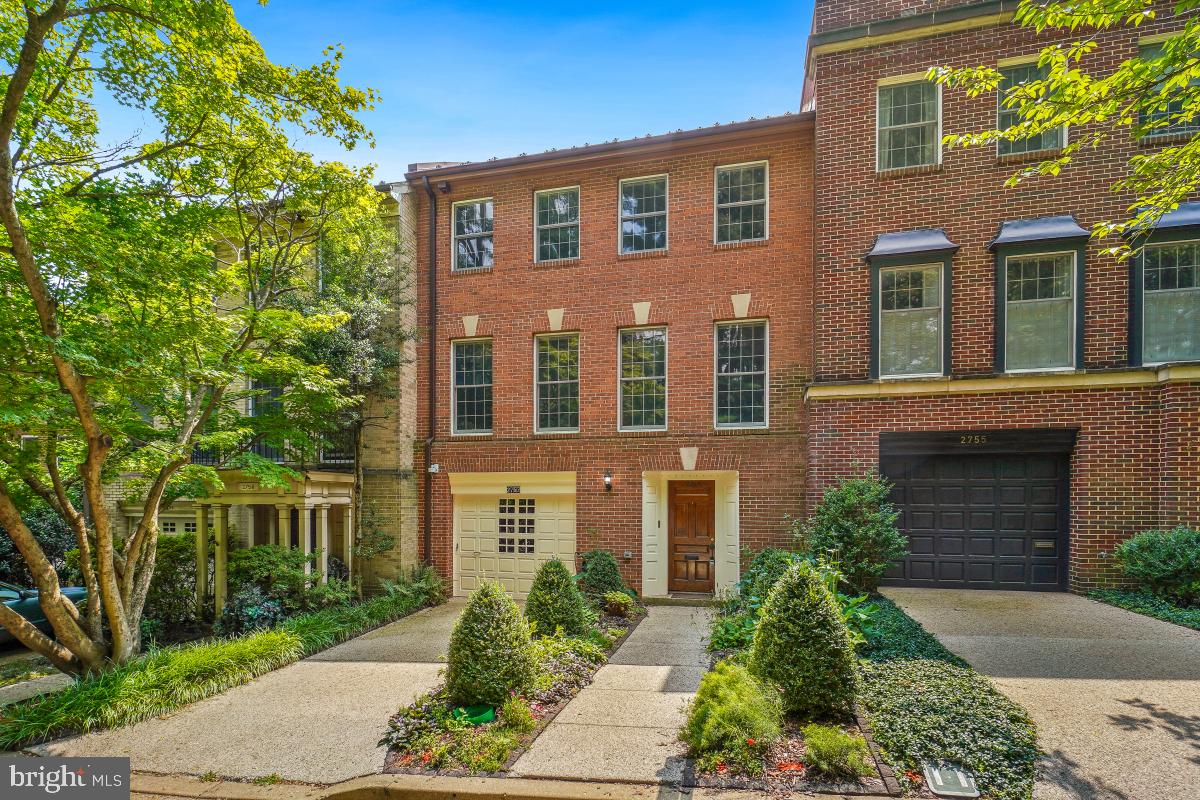 2757 Unicorn Lane Northwest Washington, DC 20015 - Photo 2 of 43 a front view of a house with garden