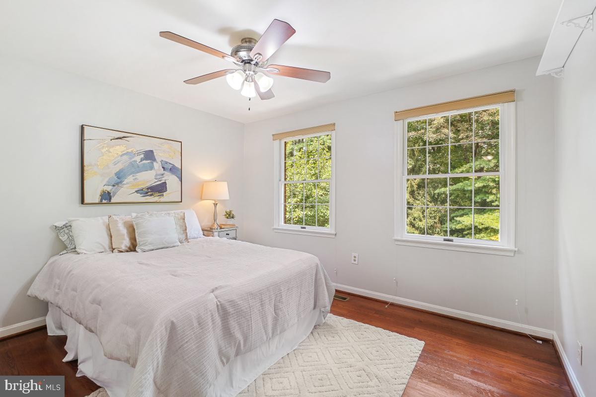 2757 Unicorn Lane Northwest Washington, DC 20015 - Photo 27 of 43 a bedroom with a large bed and a window
