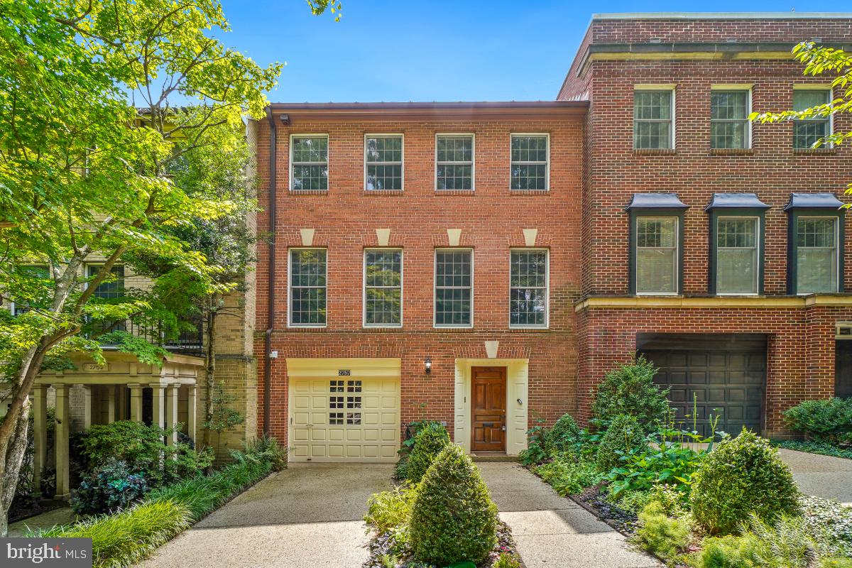 2757 Unicorn Lane Northwest Washington, DC 20015 - Photo 3 of 43 a front view of a house with garden