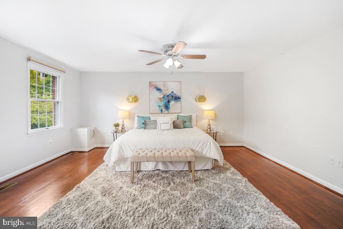 2757 Unicorn Lane Northwest Washington, DC 20015 - Photo 34 of 43 a bedroom with a bed and a window