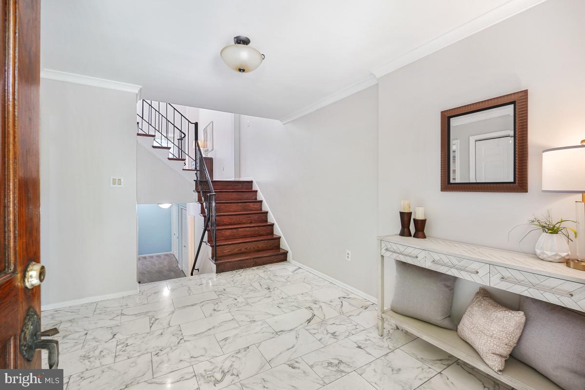 2757 Unicorn Lane Northwest Washington, DC 20015 - Photo 4 of 43 a bathroom with a sink and a mirror