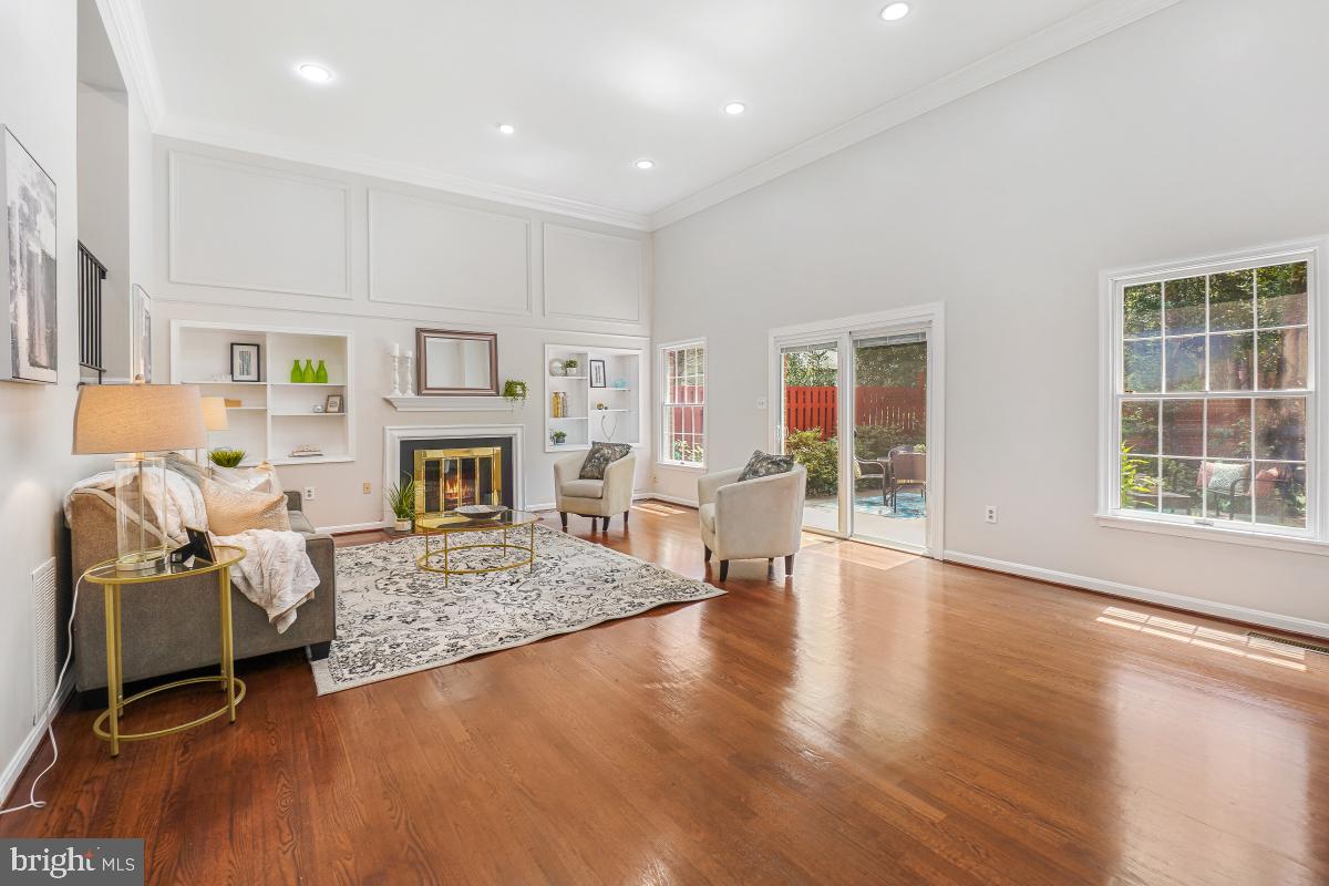 2757 Unicorn Lane Northwest Washington, DC 20015 - Photo 7 of 43 a living room with furniture and a fireplace