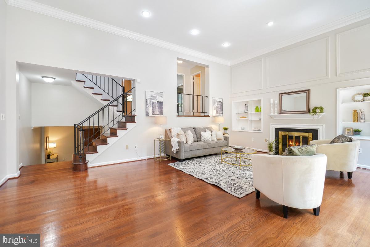 2757 Unicorn Lane Northwest Washington, DC 20015 - Photo 8 of 43 a living room with furniture and a fireplace