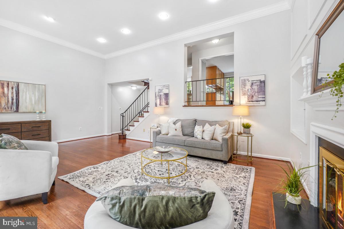 2757 Unicorn Lane Northwest Washington, DC 20015 - Photo 9 of 43 a living room with furniture and a fireplace