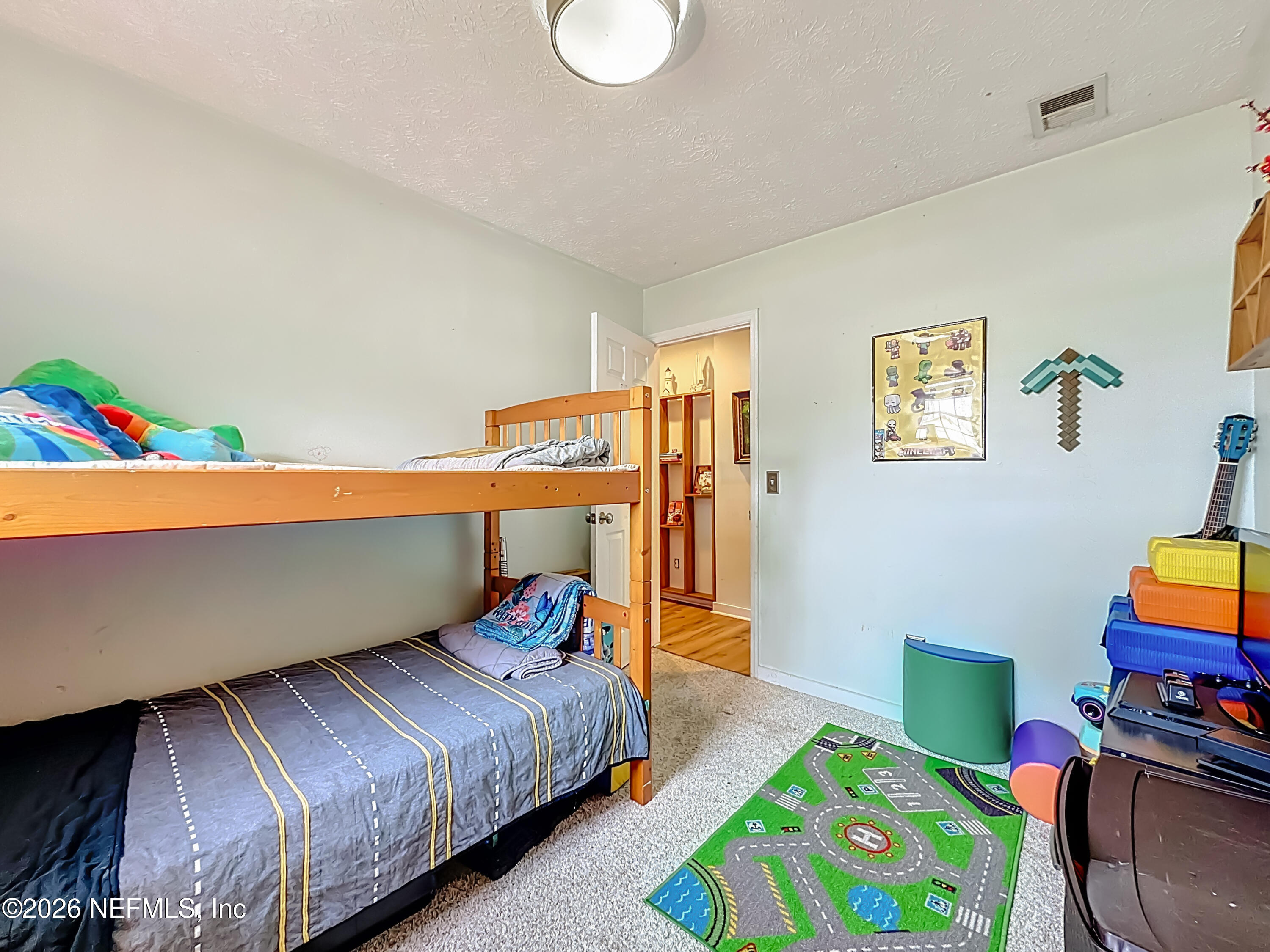 8302 Cassie Road Jacksonville, FL 32221 - Photo 33 of 48 a bedroom with bed and a window