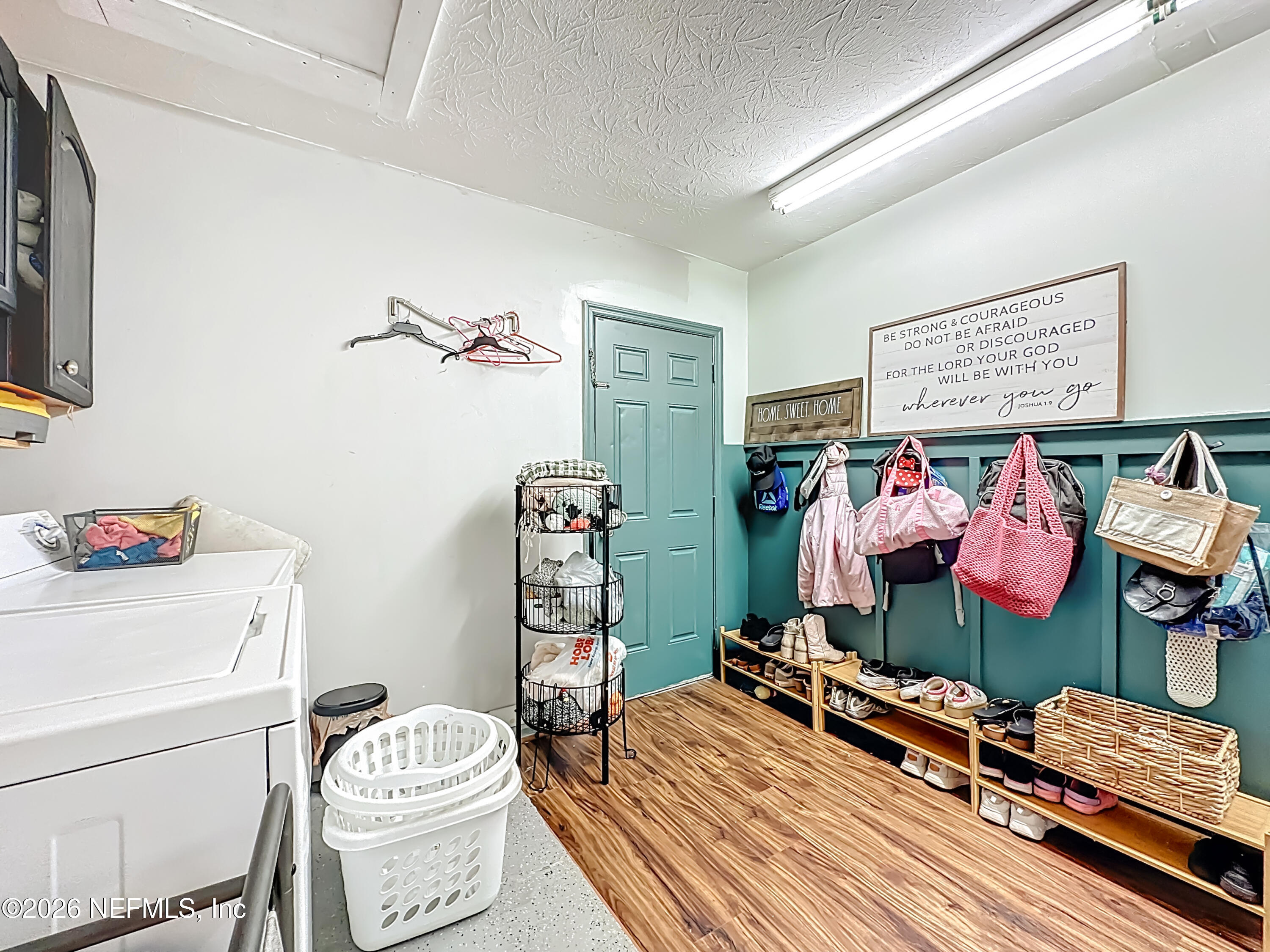 8302 Cassie Road Jacksonville, FL 32221 - Photo 39 of 48 a room with gym equipment and a table
