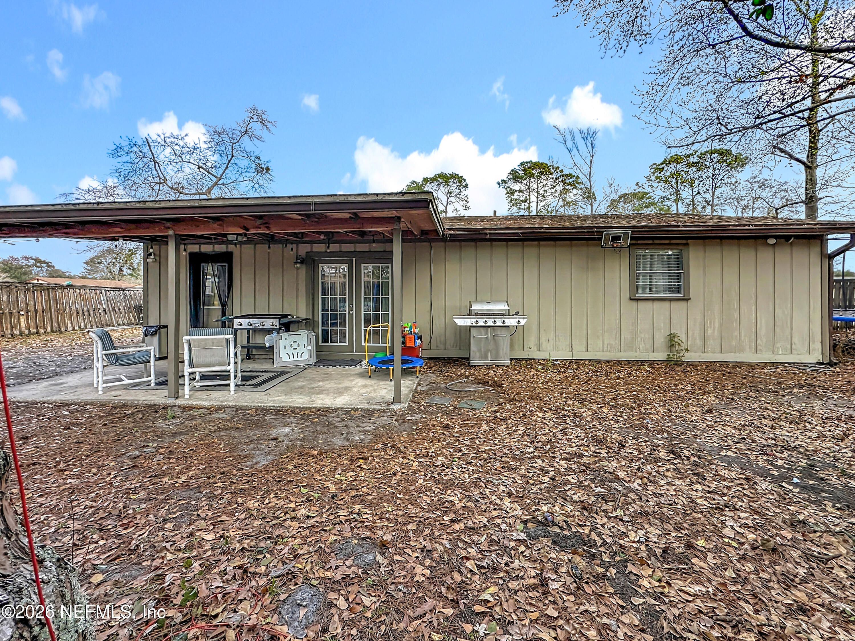 8302 Cassie Road Jacksonville, FL 32221 - Photo 43 of 48 a front view of a house with garden