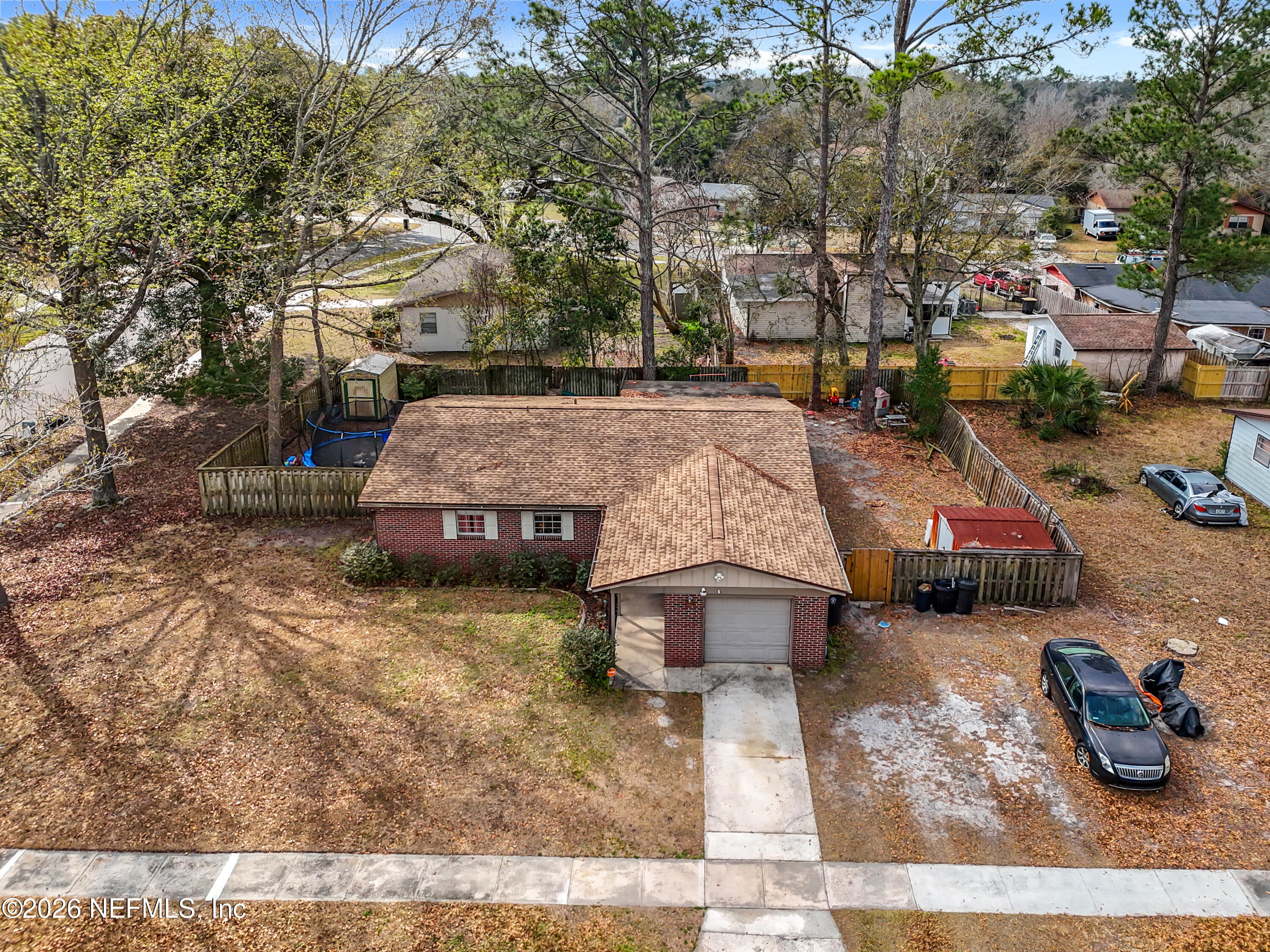 8302 Cassie Road Jacksonville, FL 32221 - Photo 47 of 48 a aerial view of a house with garden view
