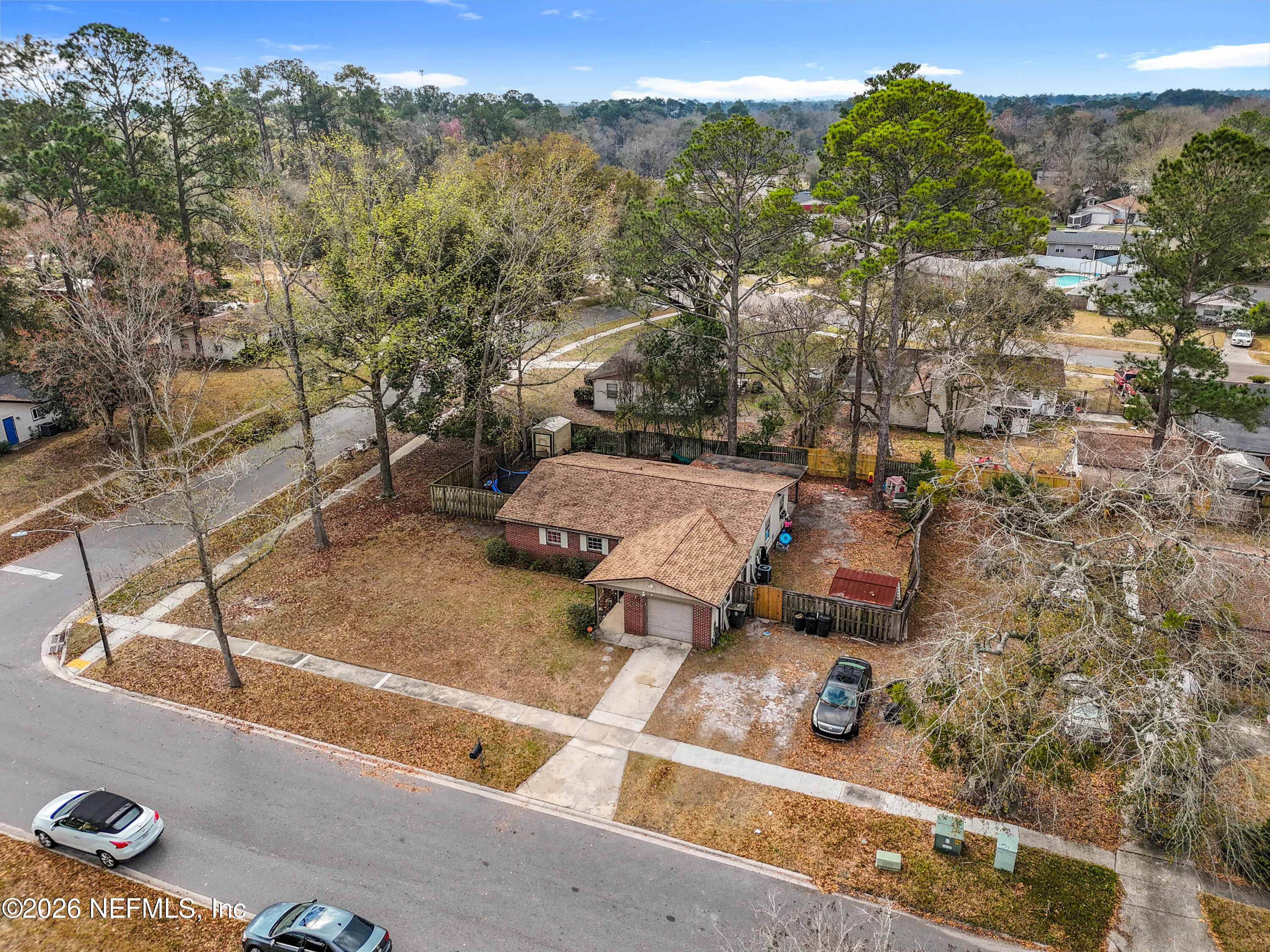8302 Cassie Road Jacksonville, FL 32221 - Photo 5 of 48 an aerial view of a yard with horses