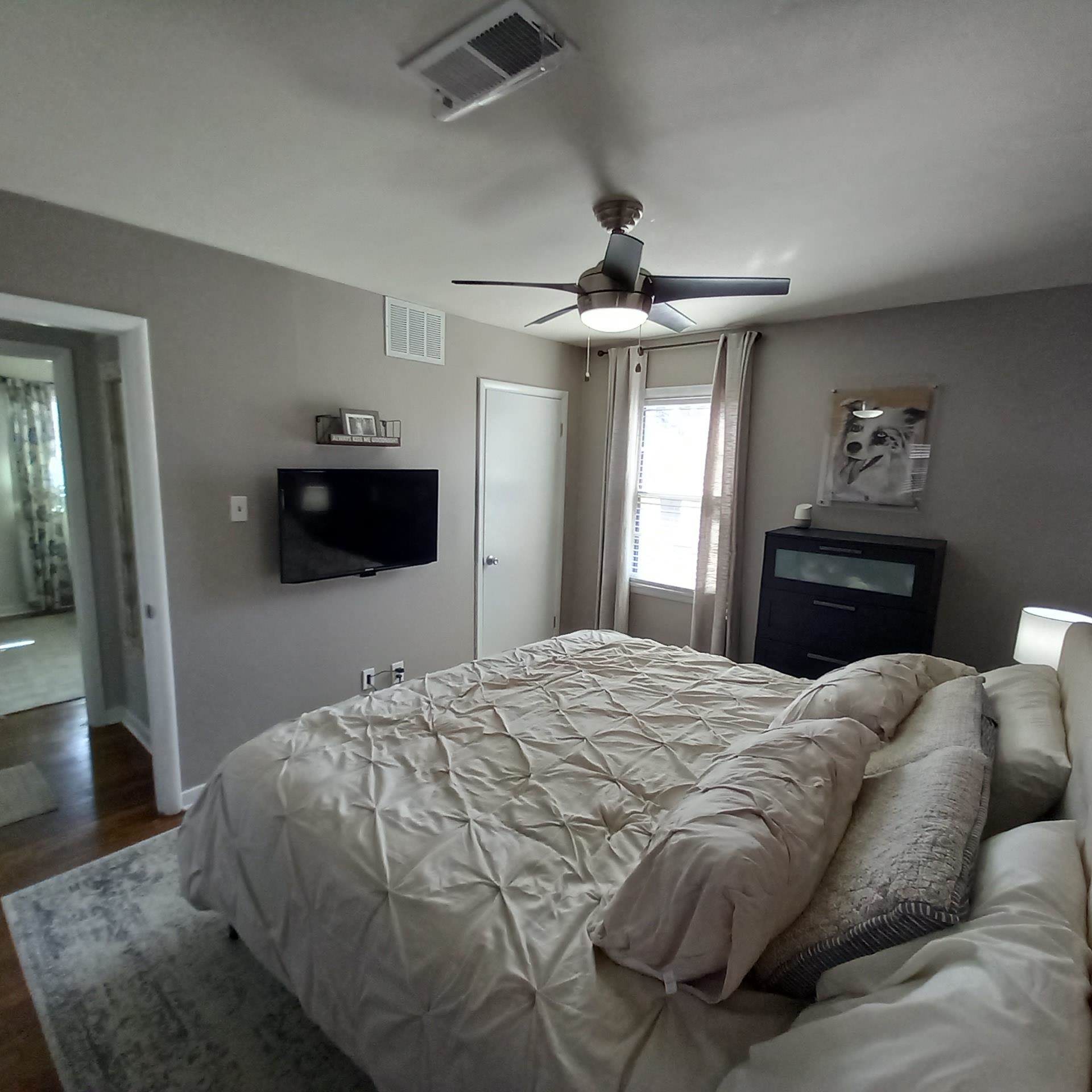 5068 Flamingo Road Memphis, TN 38117 - Photo 16 of 20 a bedroom with a bed and ceiling fan
