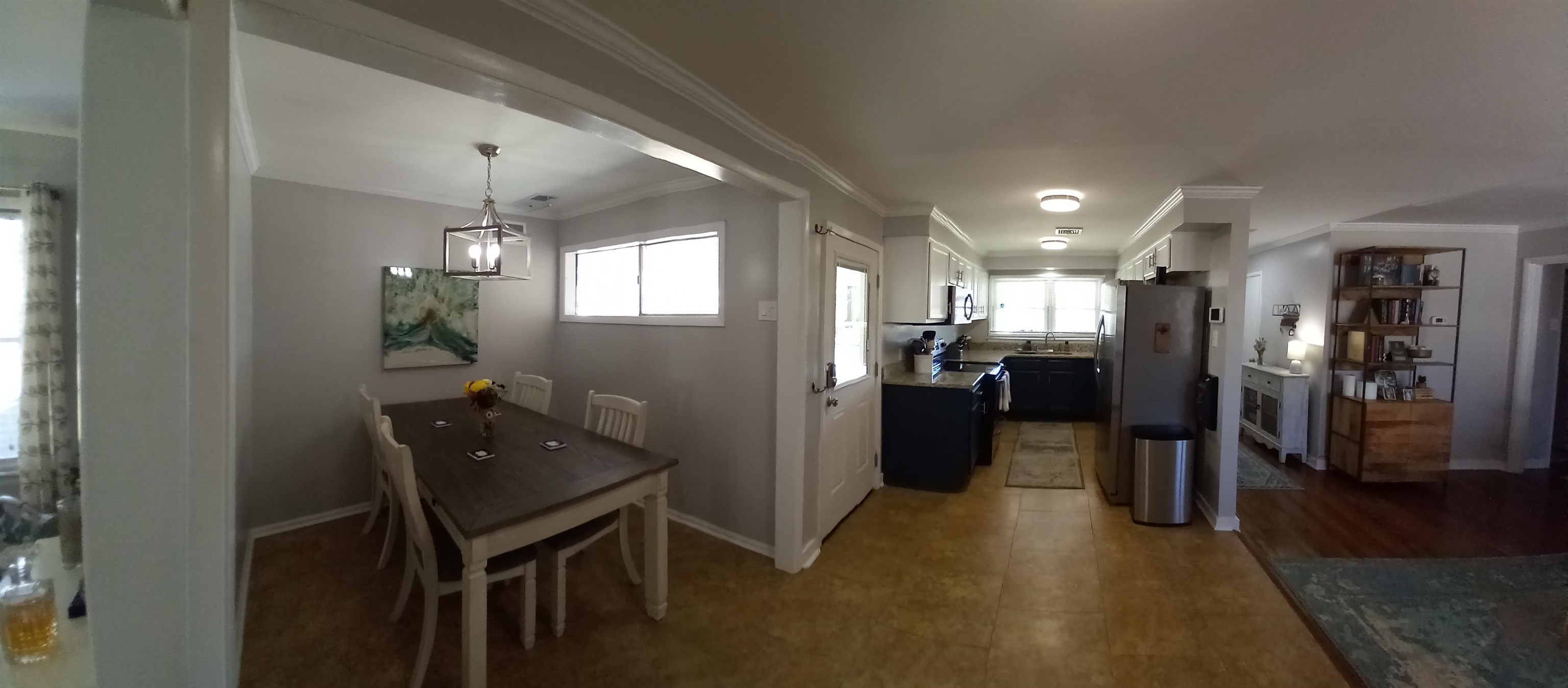 5068 Flamingo Road Memphis, TN 38117 - Photo 7 of 20 a view of a hallway view with living room and dining room