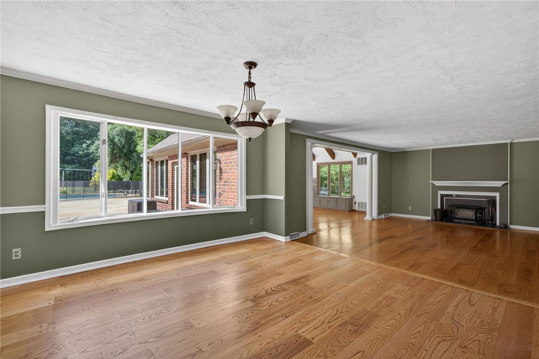 1371 Stoke Park Road Bethlehem, PA 18017 - Photo 17 of 55 a view of an empty room with window and fire place