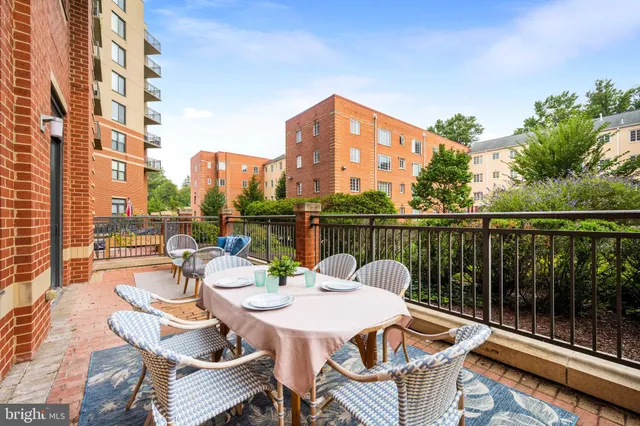 a view of a balcony with a patio