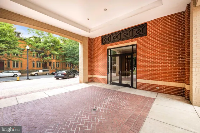 a view of a building with door and outdoor space