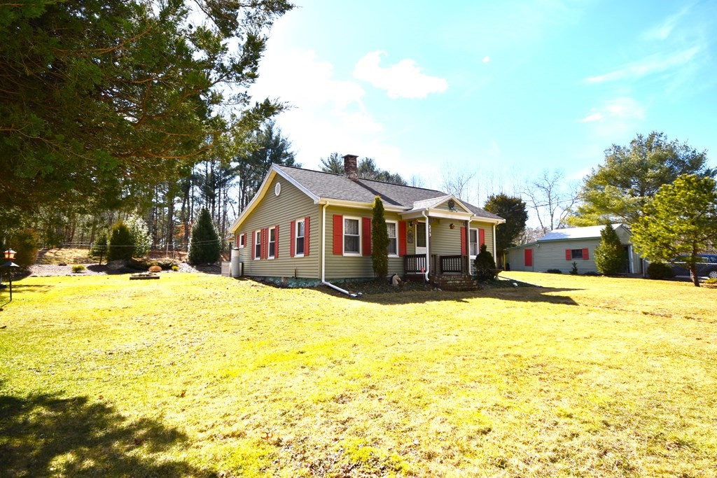 273 Snipatuit Road Rochester, MA 02770 - Photo 1 of 7 a front view of house with yard and swimming pool