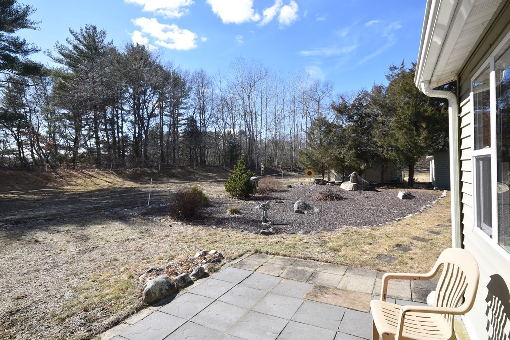 273 Snipatuit Road Rochester, MA 02770 - Photo 3 of 7 a view of outdoor space with trees