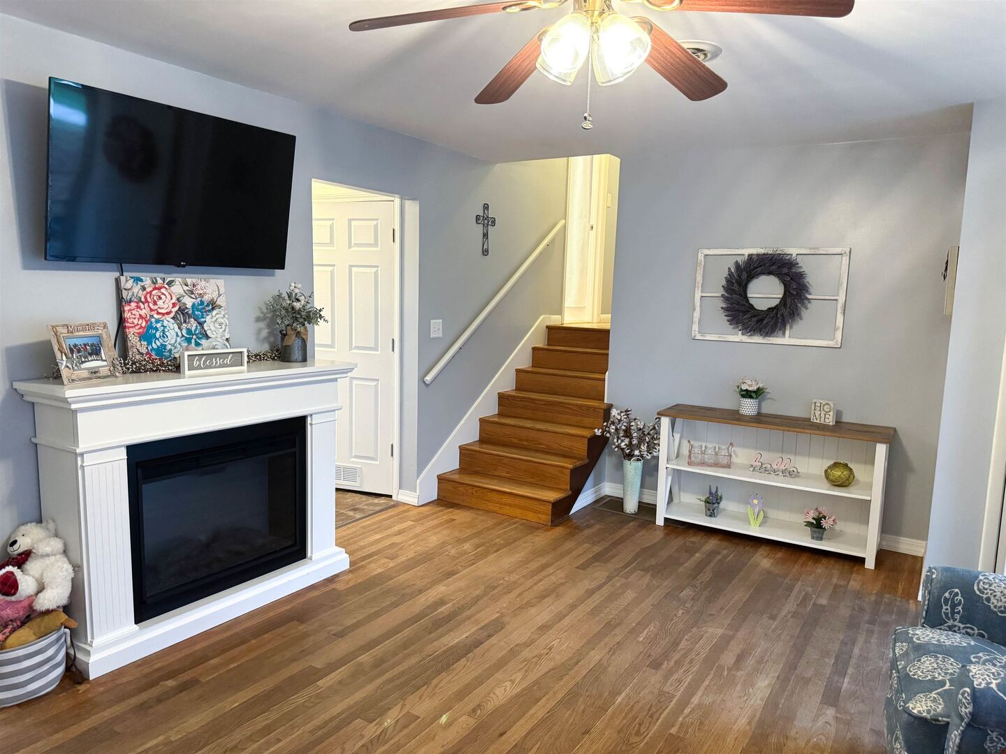 300 Williford Road Jonesboro, IL 62952 - Photo 17 of 34 Living room with a glass covered fireplace, dark w