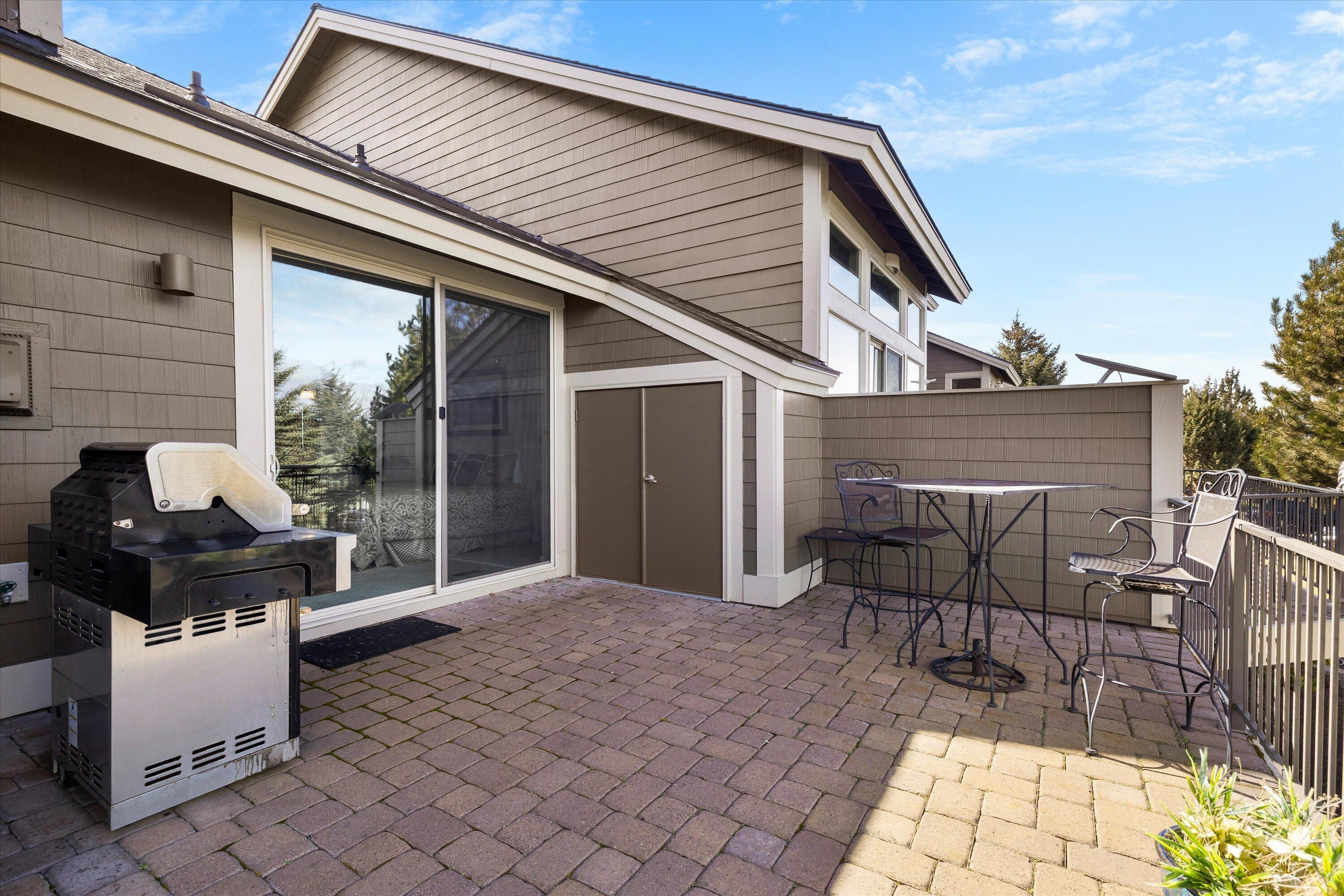 10879 Village Loop Redmond, OR 97756 - Photo 24 of 37 Large outdoor paver deck