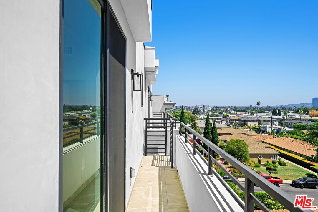1959 Preuss Road Los Angeles, CA 90034 - Photo 24 of 29 a city view from a balcony