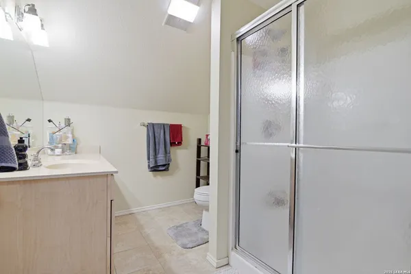 a bathroom with a sink and toilet