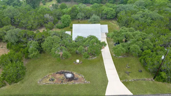 a view of a back yard of the house