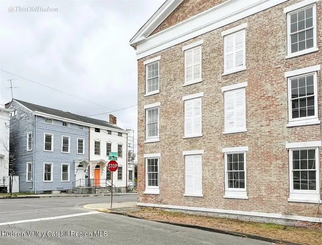 a view of building with a street