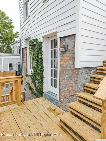 a view of a house with a roof deck