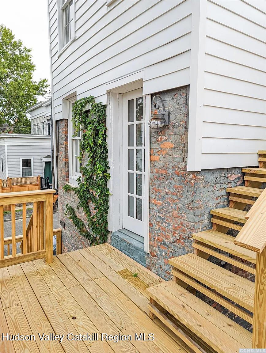 30 Union Street, Unit 2 Hudson, NY 12534 - Photo 4 of 10 a view of a house with a roof deck
