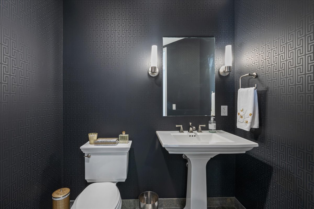 401 North Wabash Avenue, Unit 73F Chicago, IL 60611 - Photo 13 of 40 a bathroom with a sink and a toilet